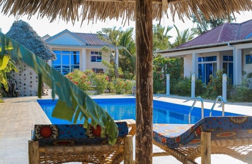 Makunduchi Villa | Coral Cliff Villas - Garden view villa 1