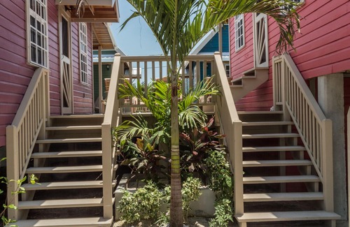 Cayo Corker Cabaña | Coral Cottage en Low Caye Cottages 1 de 4 grandes cabañas