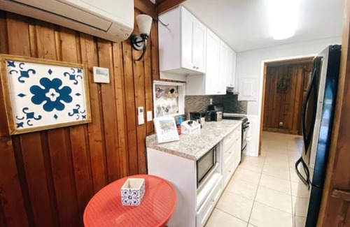 Vacation Village Casa | Coral Cottage-Pvt lake & pool access Near theme parks w/porch