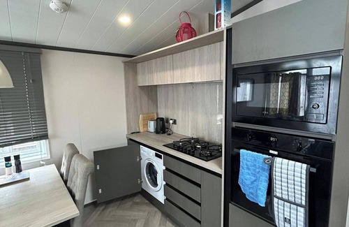 Boat of Garten Cabina | Corrie Fee Lodge, Boat of Garten,sleeps 4, pet friendly, large deck