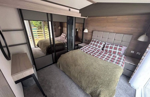 Boat of Garten Cabina | Corrie Fee Lodge, Boat of Garten,sleeps 4, pet friendly, large deck