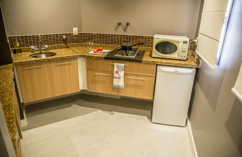 Gonzaga Apartamento | Cosmopolitan Praia Flat
