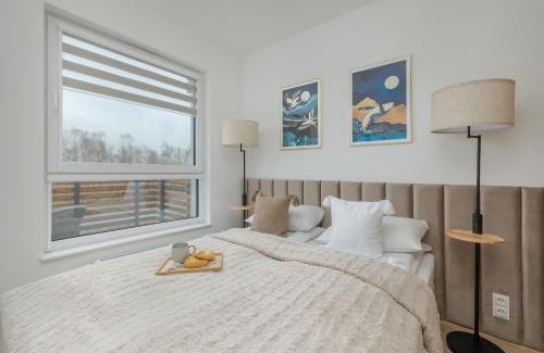 Dzwirzyno Apartamento | Cosy and Bright Apartment in Dźwirzyno with Furnished Balcony and Free Parking by Noclegi Renters
