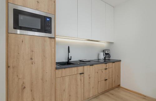 Dzwirzyno Apartamento | Cosy and Bright Apartment in Dźwirzyno with Furnished Balcony and Free Parking by Noclegi Renters