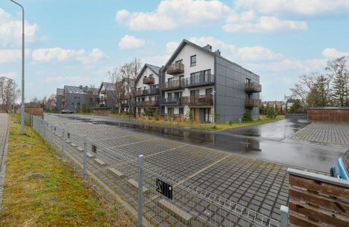 Dzwirzyno Apartamento | Cosy and Bright Apartment in Dźwirzyno with Furnished Balcony and Free Parking by Noclegi Renters
