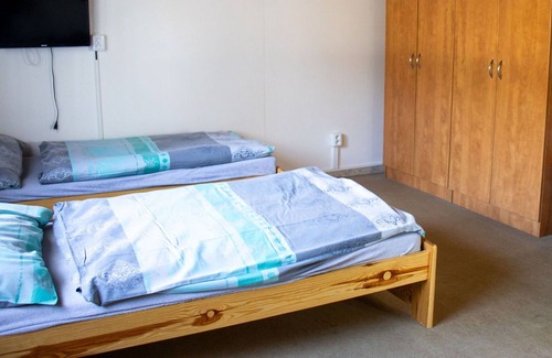 Hradec Kralove Casa | Cosy apartment in villa for 12 people with WIFI, TV, patio, pets allowed and parking