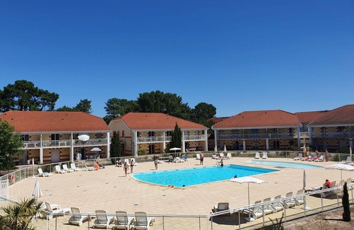 Le Verdon-sur-Mer Apartamento | Bonito apartamento para 6 personas con piscina, WIFI, TV, terraza, mascotas permitida y aparcamiento