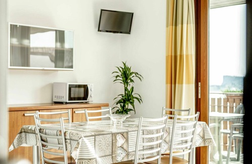Villaggio Sanghen Apartamento | Acogedor apartamento con WIFI, piscina, A/C, TV, terraza, mascotas permitida y aparcamiento