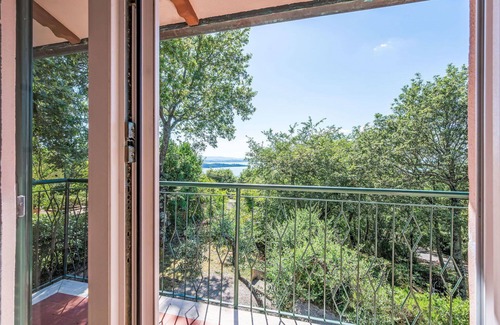 San Feliciano Apartamento | Precioso apartamento con piscina, WIFI, A/C, TV, patio, mascotas permitida y aparcamiento