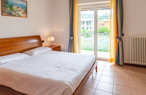 Garda Apartamento | Cosy apartment for 4 people with pool, WIFI, A/C, TV, patio and parking