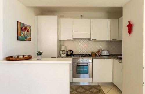 San Carlo Apartamento | Hermoso apartamento para 6 personas con TV, terraza, mascotas permitida y aparcamiento