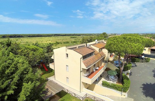 Marina di Cecina Apartamento | Hermoso apartamento con piscina, A/C, WIFI, TV, patio, mascotas permitida y aparcamiento