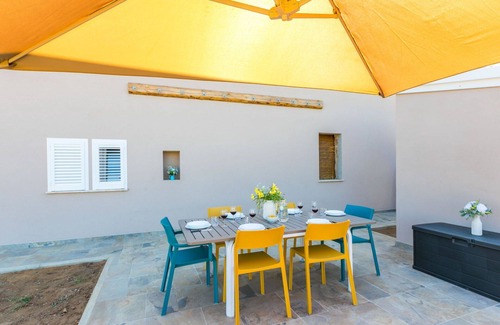 Donoratico Apartamento | Bonito apartamento para 7 personas con A/C, WIFI, mascotas permitida y aparcamiento
