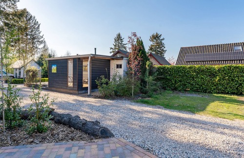 Hulshorst Chalet De Esquí | Cosy chalet with gas fireplace on the Veluwe