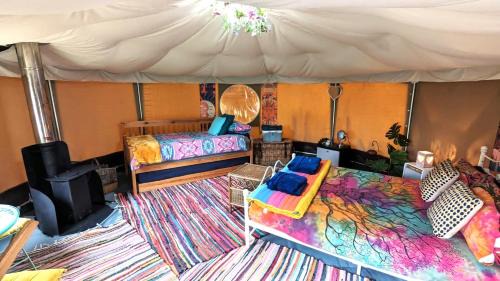 Narberth Otro | Cosy Glamping Yurt with log burner on our smallholding, ideal family getaway or romantic retreat