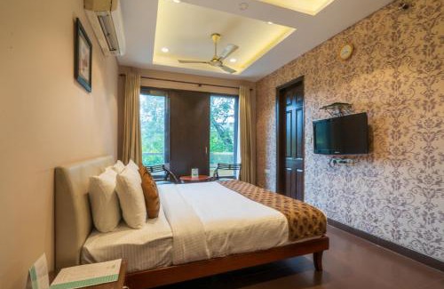 RK Puram Hotel | Cosy Grand, Chanakyapuri by The Cosy Hotels