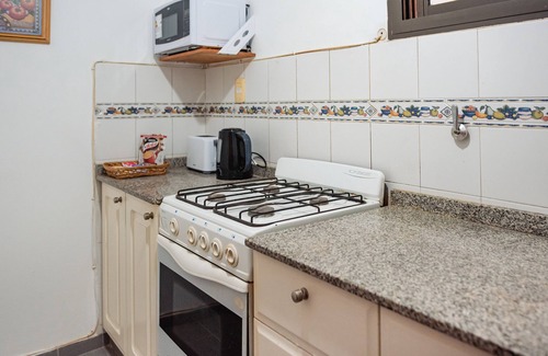 Nueva Córdoba Apartamento | Acogedor apartamento de artista local, ubicación central, totalmente equipado.
