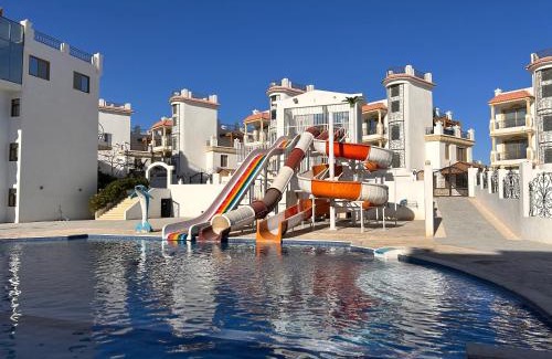 Ras Nasrani Apartamento | Cosy Studio on the First Floor with lovely Terrace and Personal Garden Area, Pool View and Free Beach Access in Sharm Hills Resort