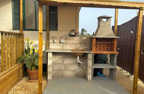 El Palmar Cabaña | Casita de campo 'Coqueta Casita' con terraza privada, Wi-Fi y aire acondicionado