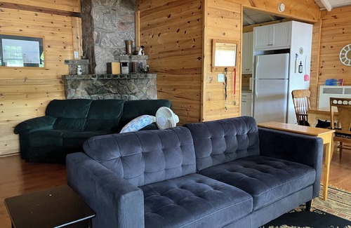 Minden Casa | Cottage on Horseshoe Lake, Minden, level lot, south facing, sandy beach