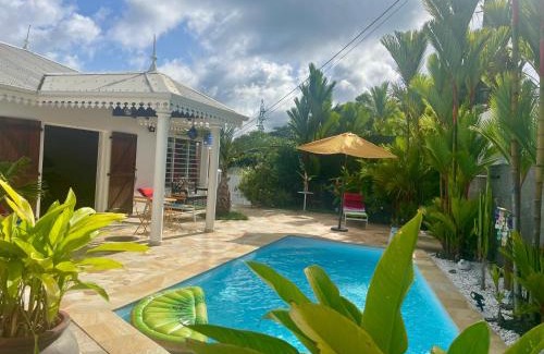 Tartane Casa | Cottage Palmier Rouge