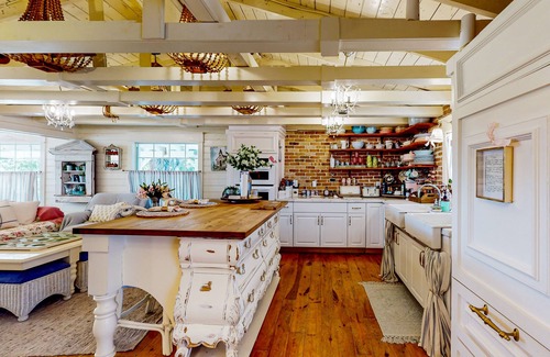 Buckingham Cabaña | Countryside cottage with firepit, garden views, French-country decor, & hammock
