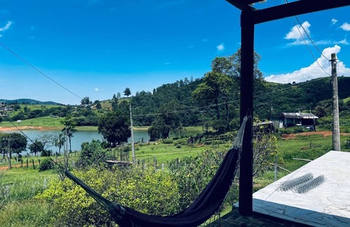 Agua Comprida Casa | Cozy farm in front of the dam, for water sports and fishing.