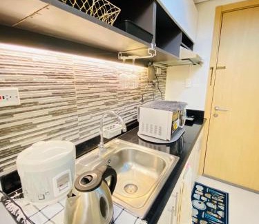 Santo Cristo Hotel | cozy 1 br with netflix and wifi at Grass residences