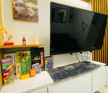 Santo Cristo Hotel | cozy 1 br with netflix and wifi at Grass residences