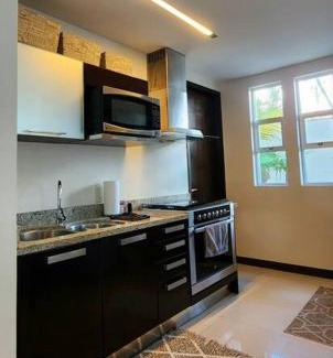 Área de la calle 12 Apartamento | Cozy 1be/1ba on 12 street gym+pool+100mbps internet