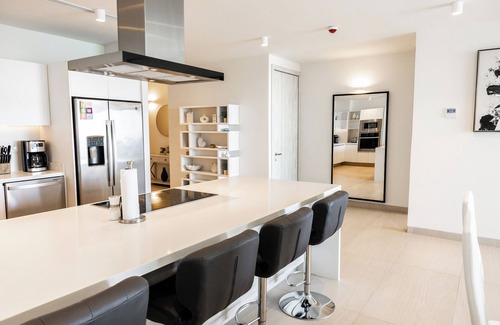Sandy Beach Condominio | Cozy 2-bedroom brand new oceanfront condo in Las Palomas phase 3 with WiFi, AC