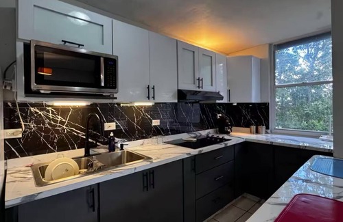 Sabana Abajo Condominio | Cozy 2 bedroom condo with pool near the airport in Carolina PR