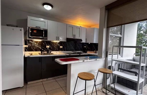 Sabana Abajo Condominio | Cozy 2 bedroom condo with pool near the airport in Carolina PR