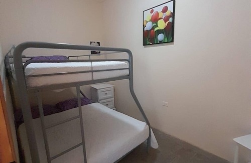 Tela Hotel | Cozy 2-bedroom hotel with AC and WiFi in delightful Tela