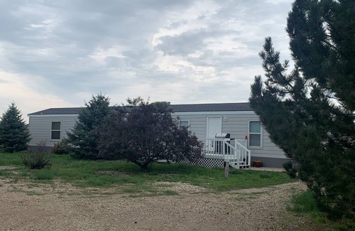 Pierre Casa | Cozy 3-bedroom mobile home in the Spring Creek Area just north of Pierre.