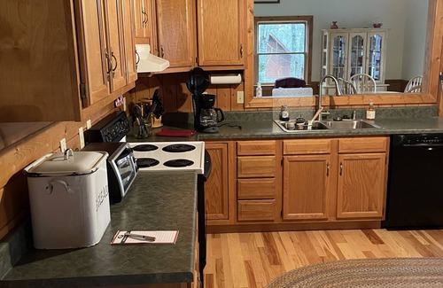 Tuckasegee Casa | Cozy, 4 front porch rocking chairs, porch swing, picnic shelter, outdoor fire.