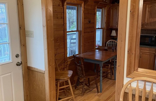 Tuckasegee Casa | Cozy, 4 front porch rocking chairs, porch swing, picnic shelter, outdoor fire.
