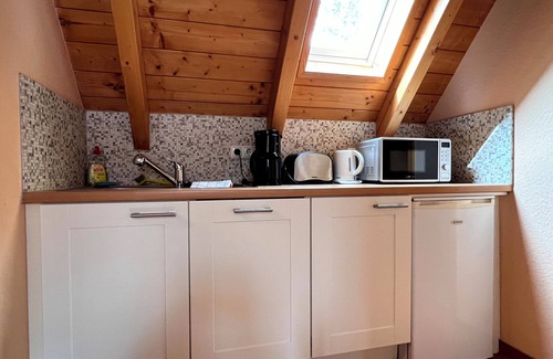 Bad Homburg v.d. Hoehe Apartamento | Cozy attic with 2 rooms, kitchen and bathroom for 2-4 persons