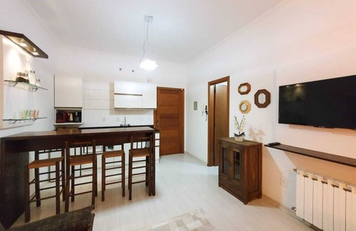 Floresta Apartamento | Acogedor apartamento en el centro de Gramado, tipo Studio, disfruta y vive el césped.