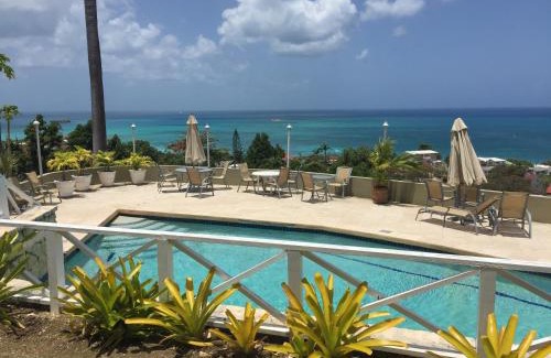 Dickenson Bay Apartamento | Cozy apartment with beach at walking distance and pool