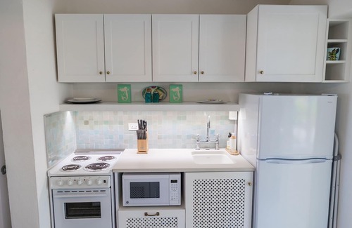 North Side Condominio | Cozy beach cottage at Sea Lodges, Cayman Kai
