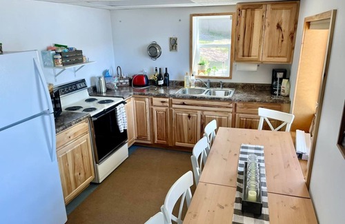 Shell Lake Cabina | Cozy Cabin on Bashaw Lake w/ dock, kayaks, and firepit.