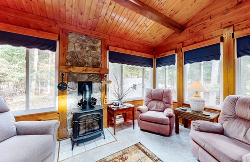 Beaver Cove Casa | Cozy cabin with covered porch, firepit, grill, fireplace, & washer/dryer