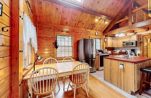 Beaver Cove Casa | Cozy cabin with covered porch, firepit, grill, fireplace, & washer/dryer