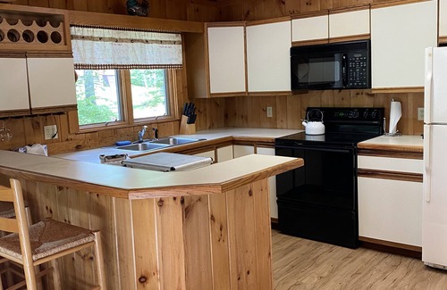 Chocorua Ski and Beach Casa | Cozy cabin with hot tub in a peaceful setting!