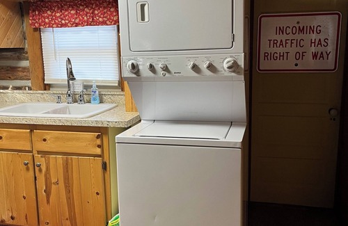 Kalkaska Cabina | Cozy cabin with wood burning fireplace. Ride in/out the snowmobile/ORV trails