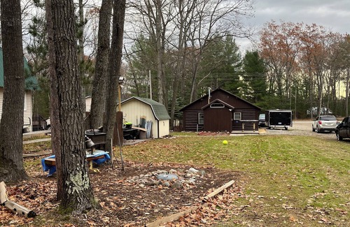Kalkaska Cabina | Cozy cabin with wood burning fireplace. Ride in/out the snowmobile/ORV trails