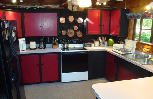 Raymond Cabaña | Cozy camp with large sandy beach and excellent views of Little Sebago.