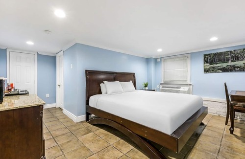Mid-City Hotel | Acogedor y fácil en Budget Express Studios