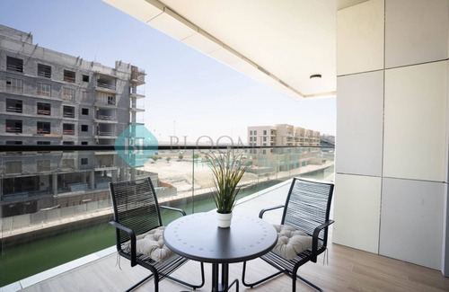 Al Raha Beach Apartamento | Cozy Canal View Apartment - 206